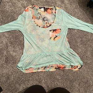 Floral quarter sleeve top with sheer back